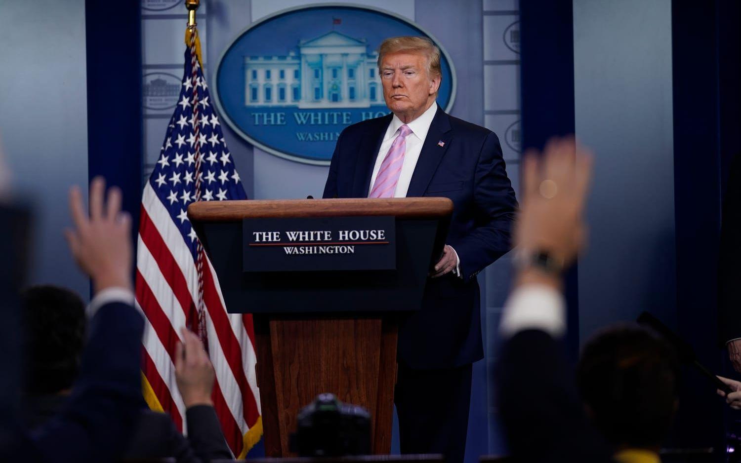 President Donald Trump under fredagens pressträff. 