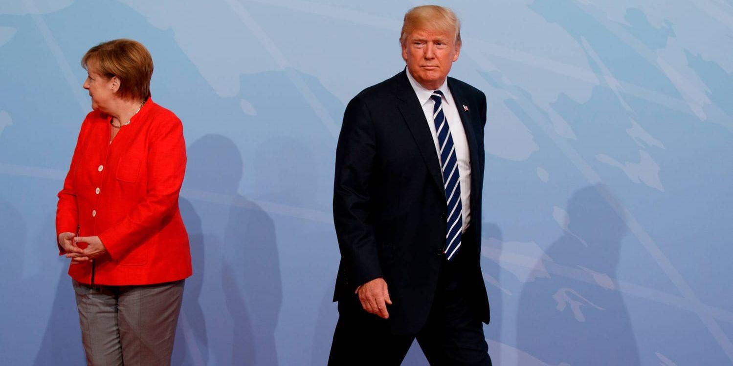 Tysklands förbundskansler Angela Merkel tar emot USA:s president Donald Trump på G20-mötet.