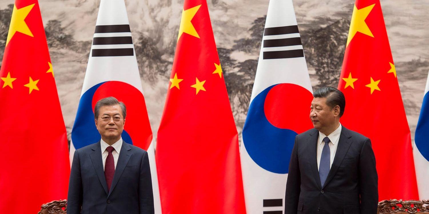 Sydkoreas president Moon Jae-In och hans kinesiske kollega Xi Jinping i Peking.