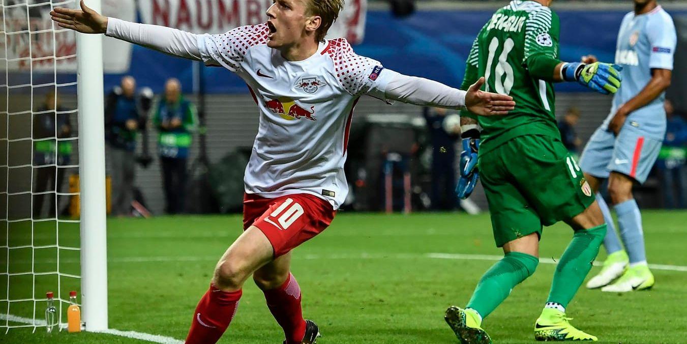Leipzigs svenske vänsterytter Emil Forsberg jublade högt efter det historiska målet hemma mot Monaco i Bundesligalagets första Champions League-match någonsin.