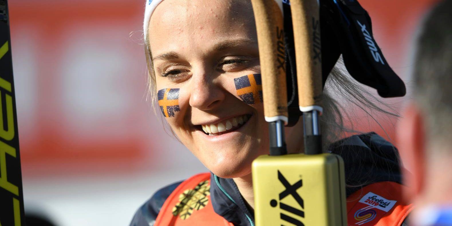 Stina Nilsson efter Sveriges VM-guld i stafett över 4x5 kilometer.